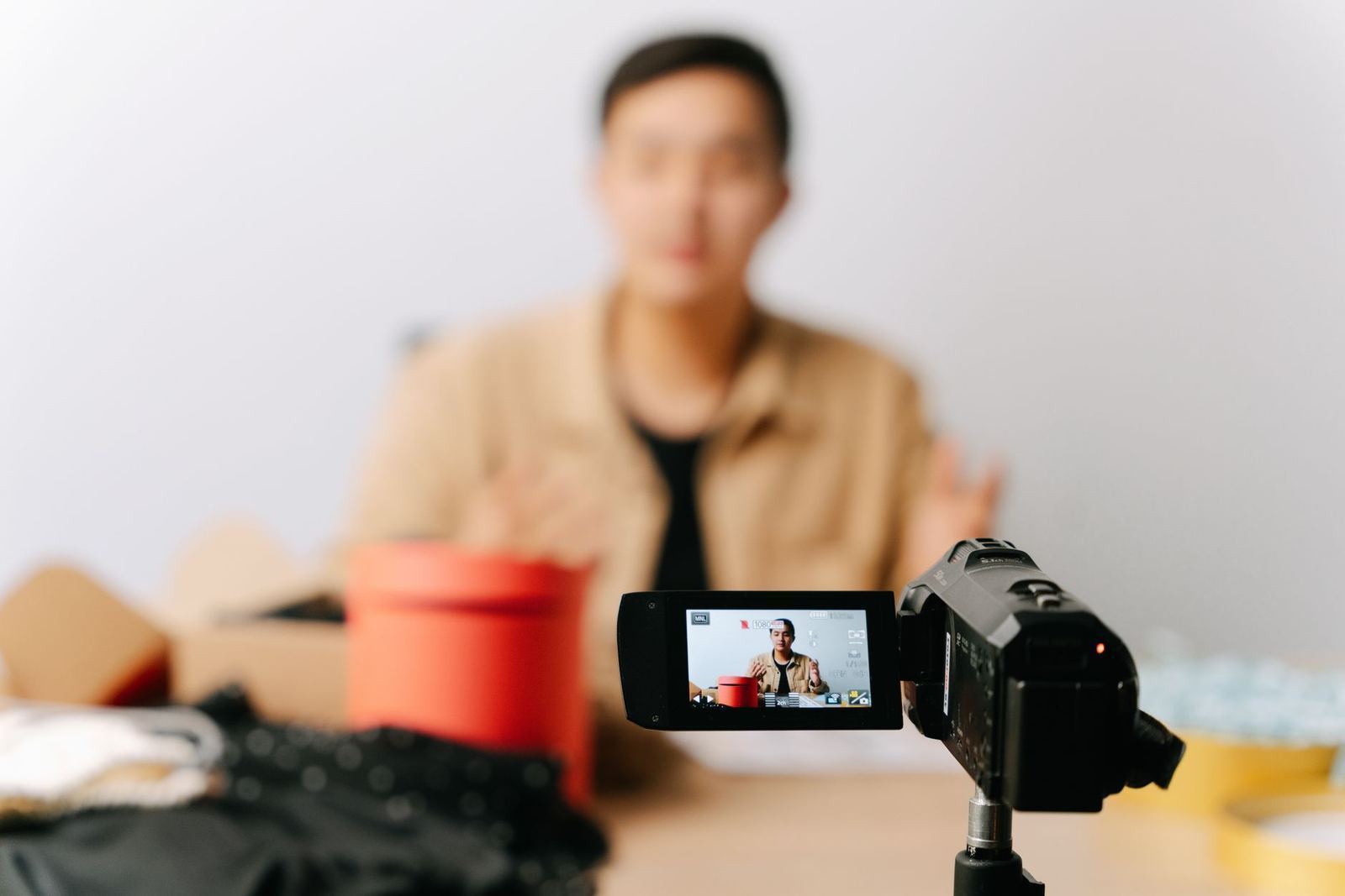 A content creator setting up a camera to film video