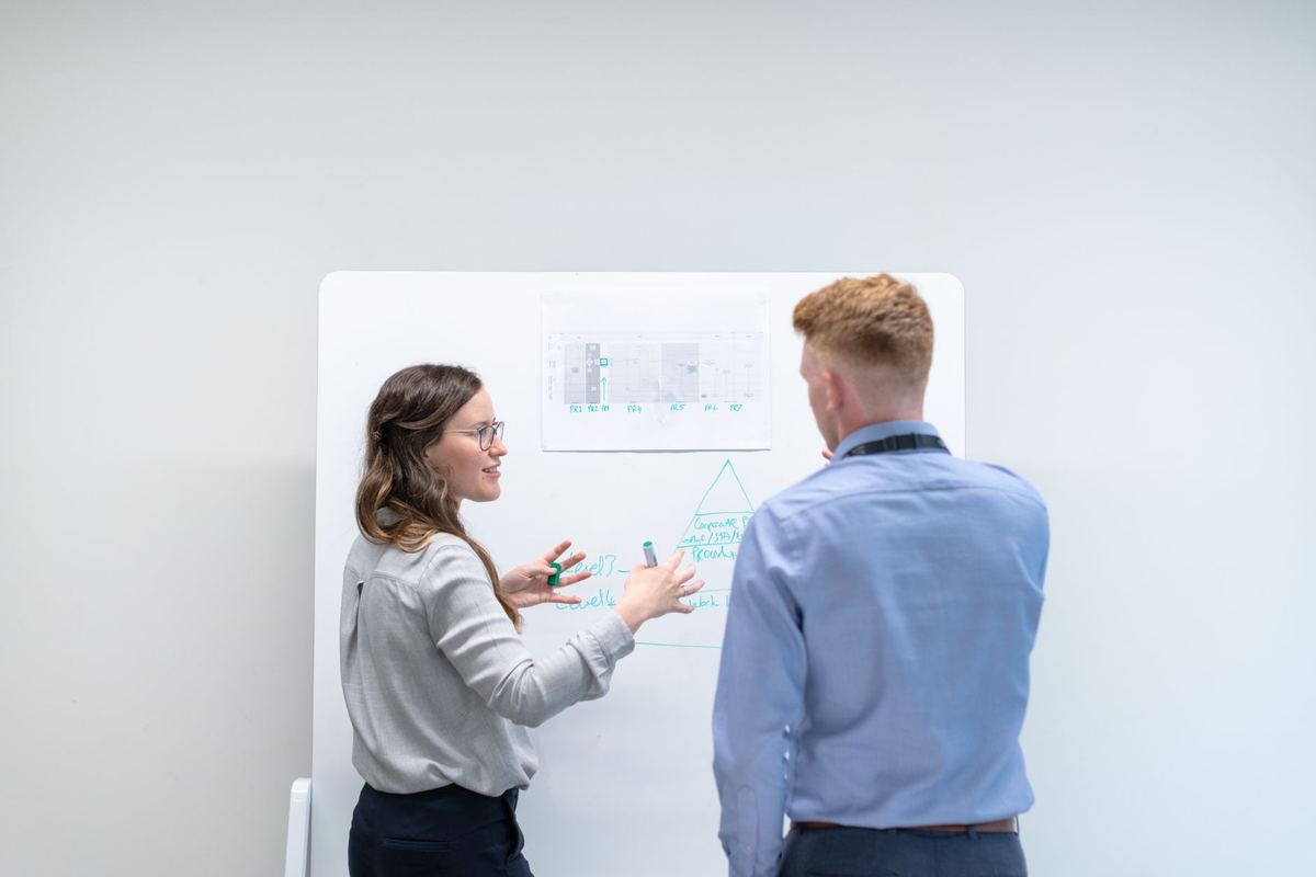 A team discussing feedback together around a table