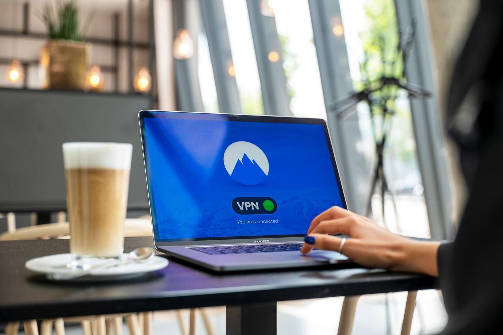 A person uploading a file from a laptop