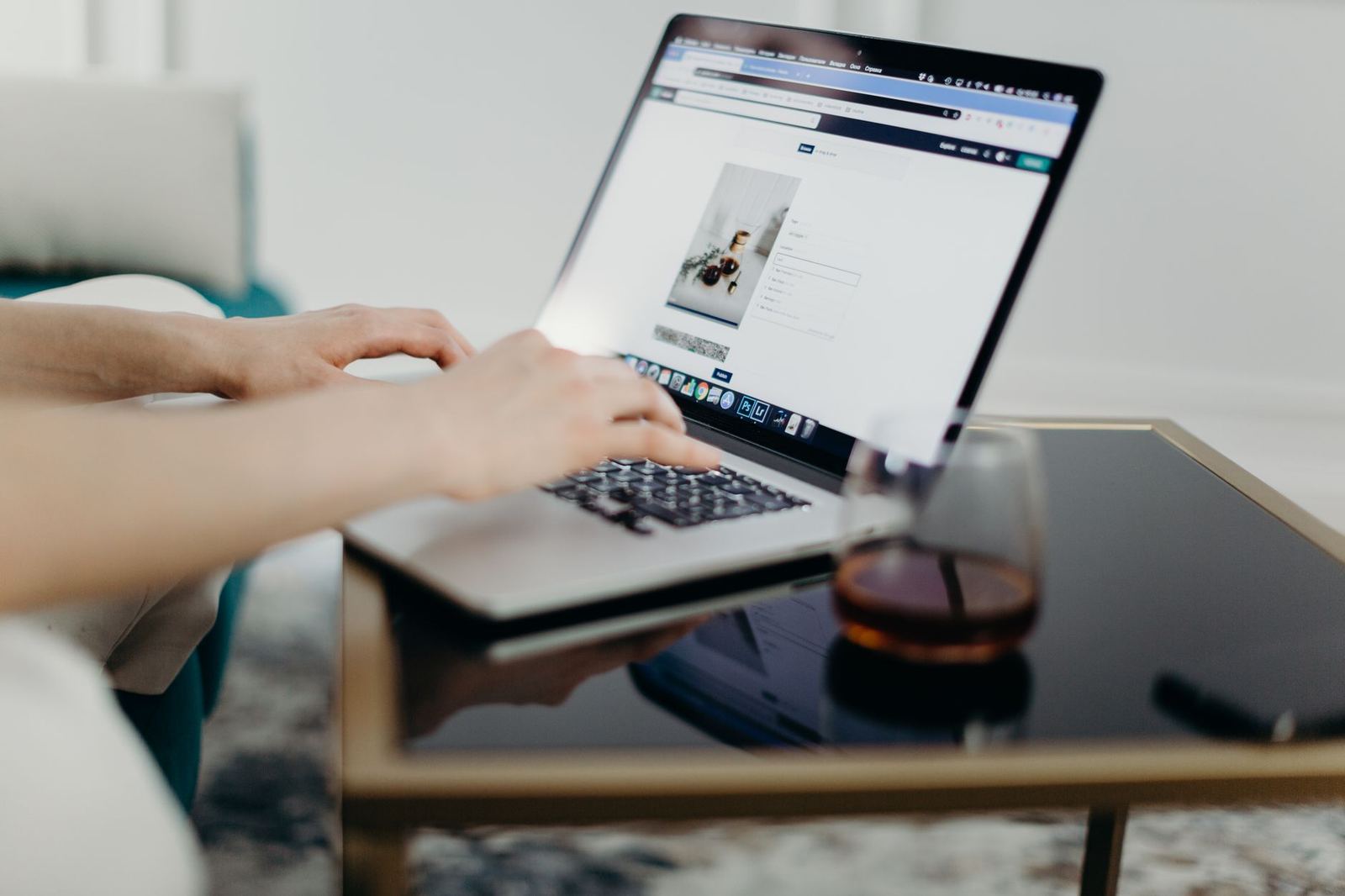 A person uploading files from a laptop